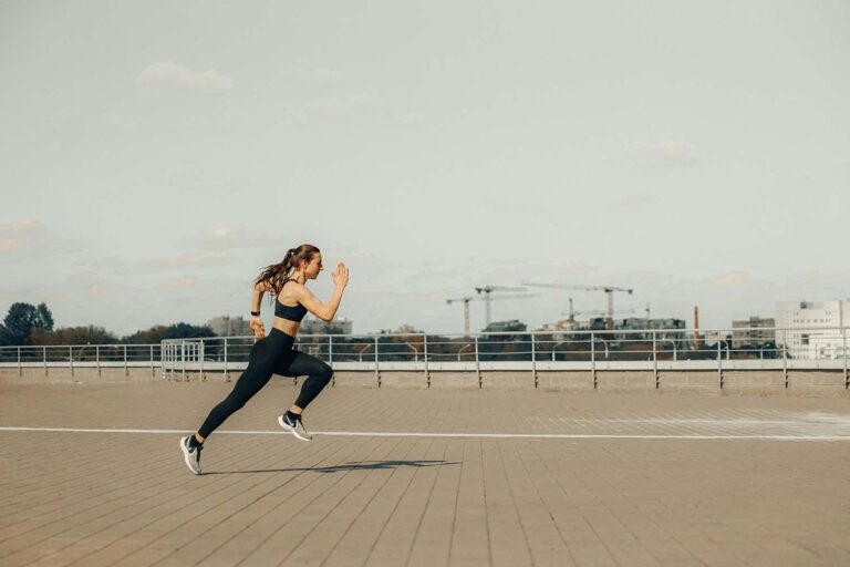 A girls running on a walkway